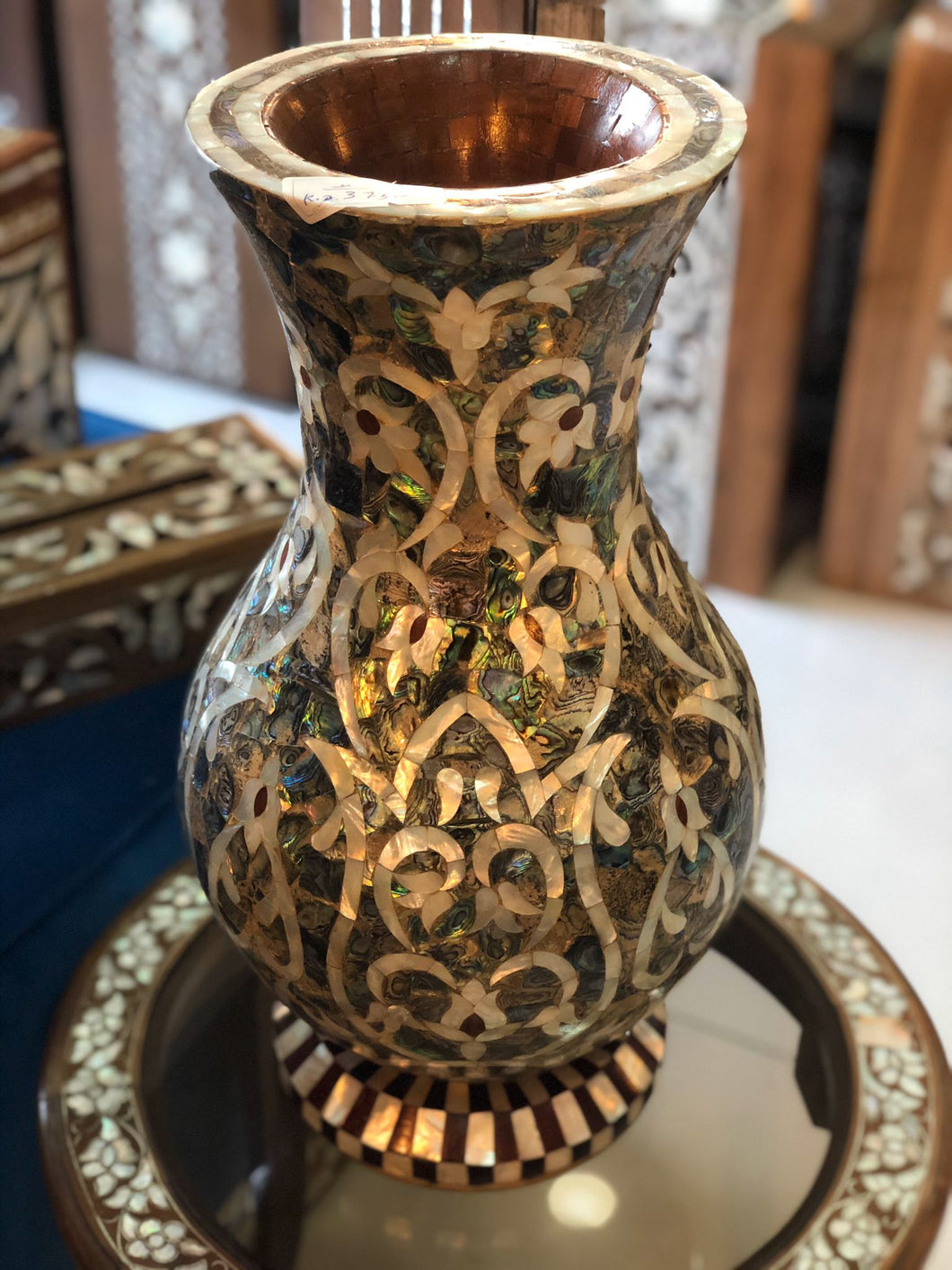 Handcrafted mother-of-pearl vase.